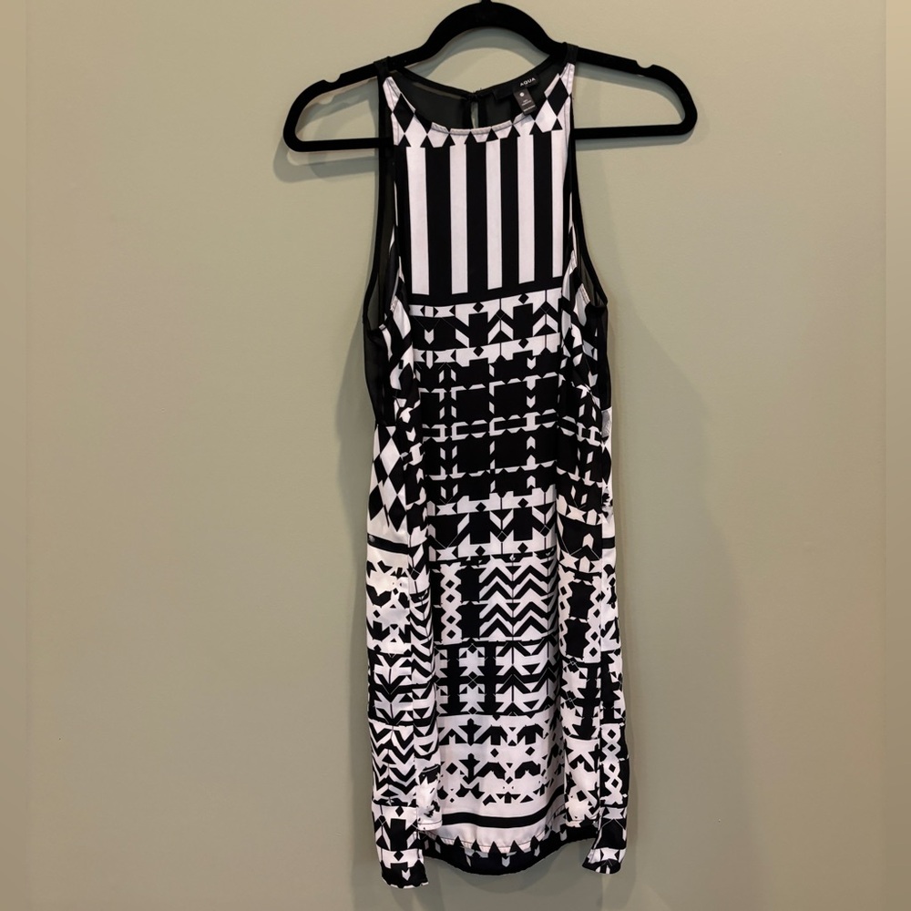 Black and white dress with a geometric pattern #dresses